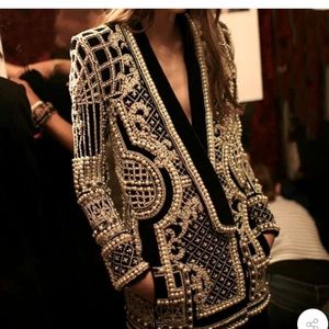 Gorgeous pearl gold and black blazer. Stunning on.